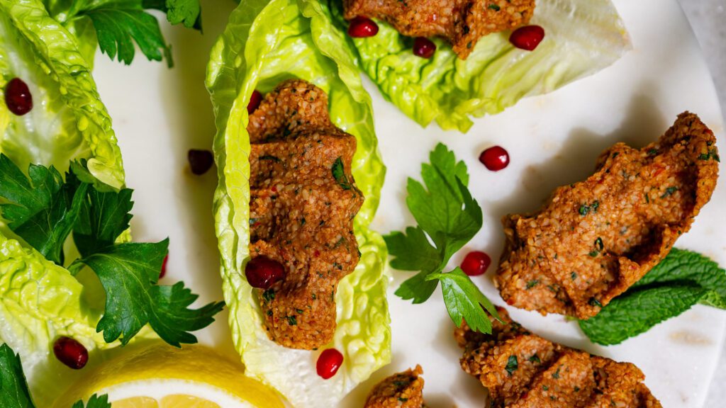 vegan cigköfte served in a lettuce leaf.