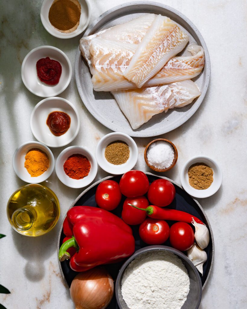 All the ingredients for samke harra on a table.